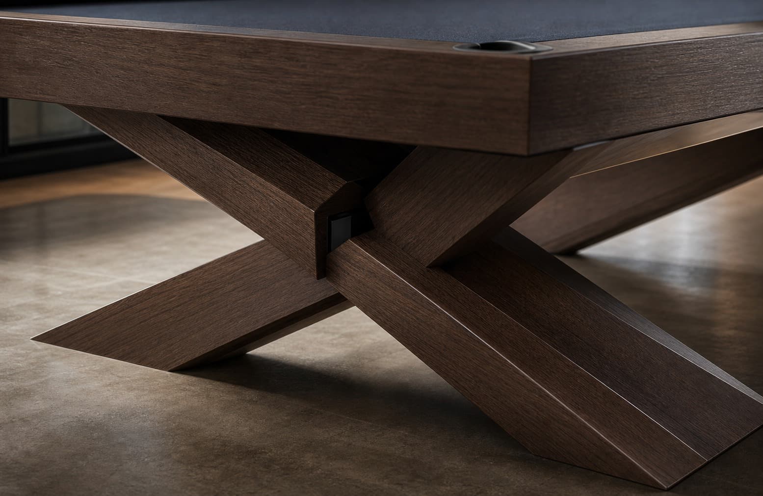 Close-up view of cross-leg billiards table geometry